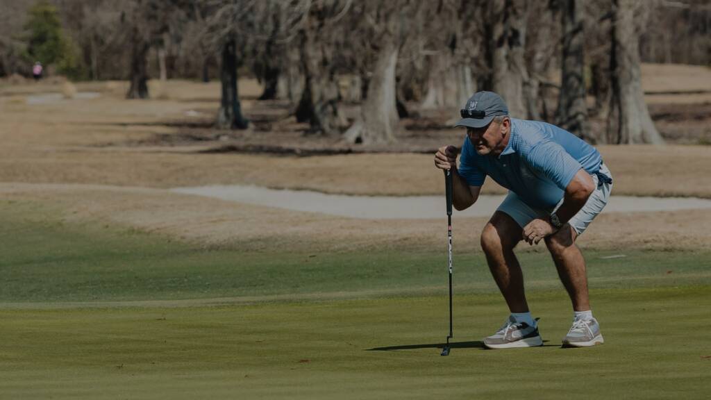 CGA golfer teeing off on a championship course