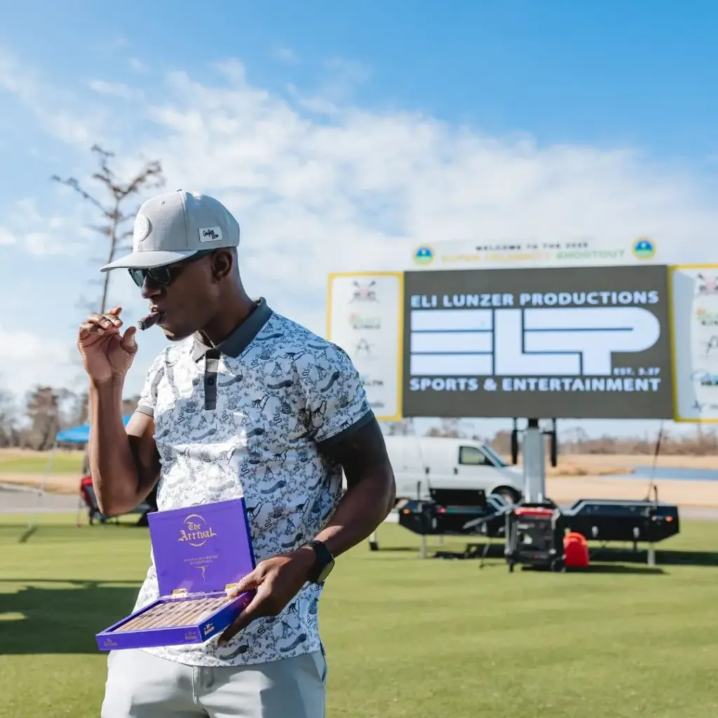 CGA Player smoking a cigar